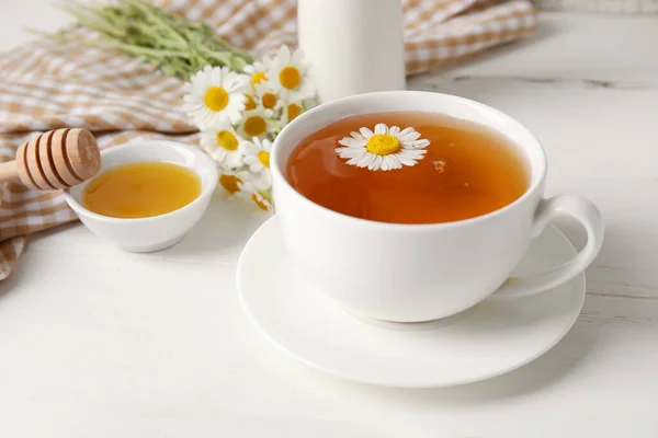 Composition Tasty Chamomile Tea Flowers Honey Light Wooden Background — Stock Photo, Image