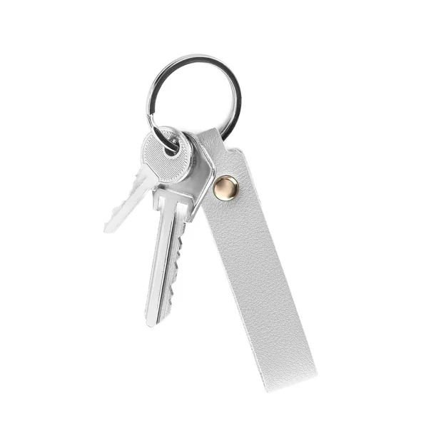 白底皮革钥匙链钥匙 — 图库照片
