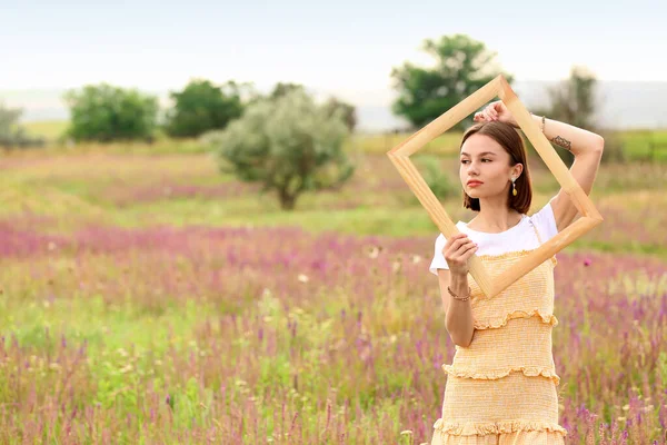 Beautiful Young Woman Photo Frame Blooming Field — Stock Photo, Image