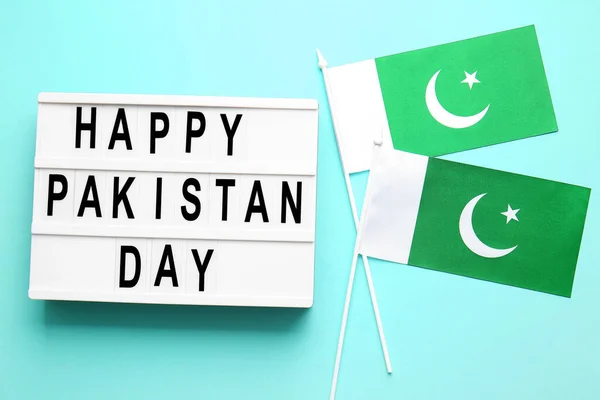 Прапори Дошка Текстом Happy Pakistan Day Кольоровому Фоні — стокове фото