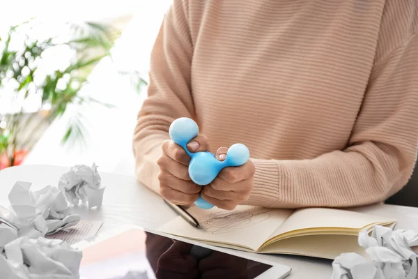 Woman Squeezing Stress Ball While Working Office — Stock Photo, Image