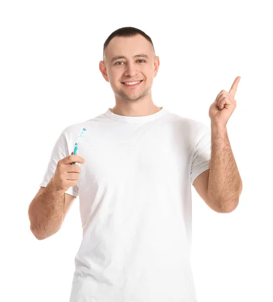 Man Tooth Brush Pointing Something White Background — Stock Photo, Image