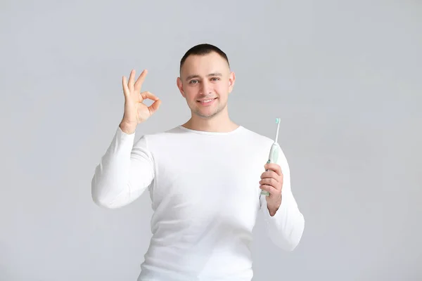 Man Tooth Brush Showing Grey Background — Stock Photo, Image