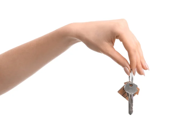 Weibliche Hand Und Schlüssel Aus Dem Haus Auf Weißem Hintergrund — Stockfoto