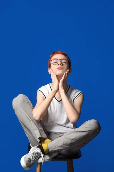 Non Binary Teenager Sitting Chair Color Background — Stock Photo, Image