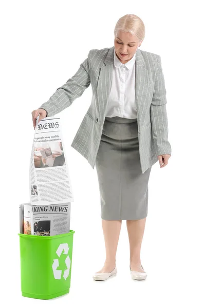 Mature Businesswoman Putting Newspapers Trash Bin White Background Recycling Concept — Stock Photo, Image