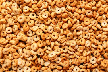 Arka plan olarak lezzetli mısır gevreği halkaları, yakın plan.