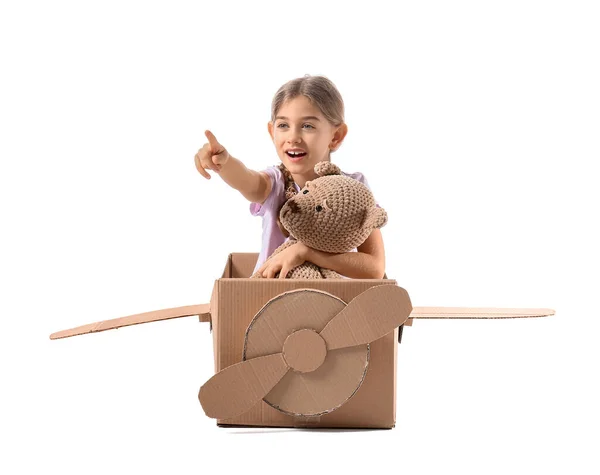 Menina Brincando Com Brinquedo Avião Papelão Fundo Branco — Fotografia de Stock