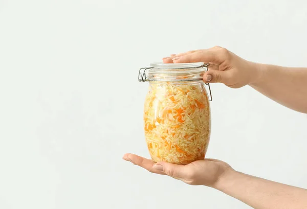 Woman Glass Jar Tasty Sauerkraut Light Background Closeup — Stock Photo, Image