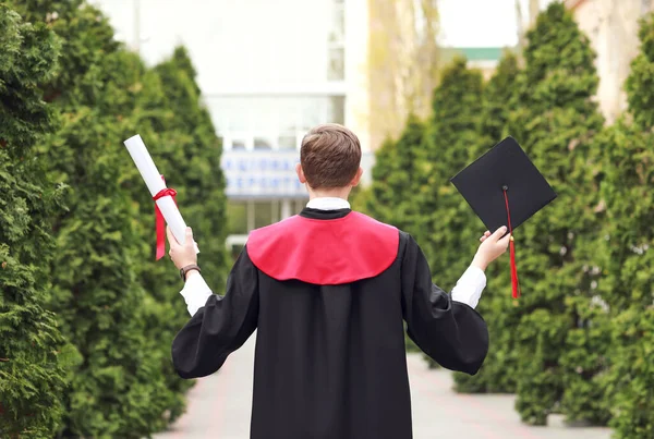 Male Graduating Student Outdoors Back View — Stock Photo, Image