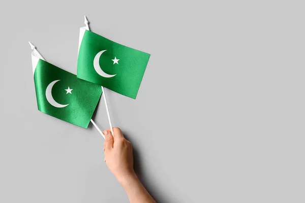 Female Hand Pakistan Flags Light Background — Stock Photo, Image