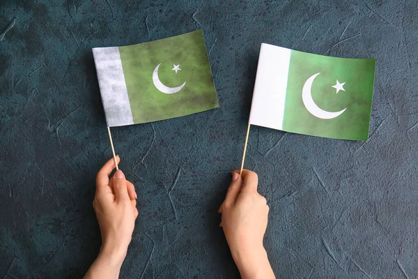 Female Hands Pakistan Flags Dark Background — Stock Photo, Image