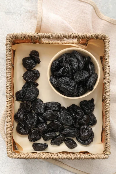 Basket Tasty Prunes Light Background — Stock Photo, Image