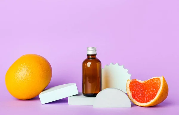 Composition Bottle Essential Oil Grapefruits Color Background — Stock Photo, Image