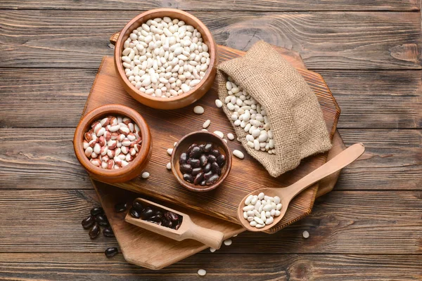 Composición Con Diferentes Tipos Frijoles Sobre Fondo Madera — Foto de Stock