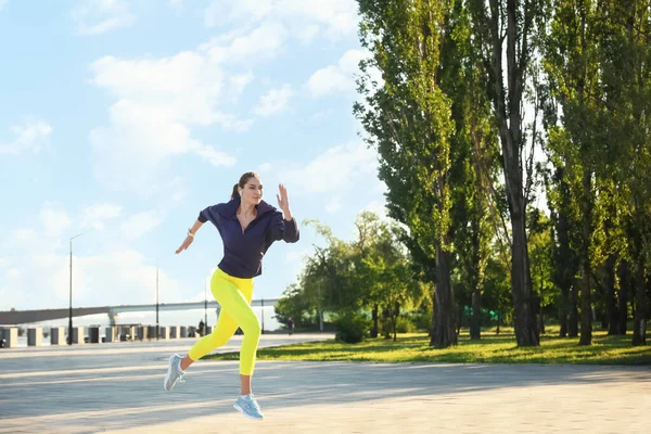 Sporty Young Woman Running Outdoors — Stock Photo, Image