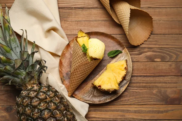 Plate Tasty Pineapple Ice Cream Wafer Cone Wooden Background — Stock fotografie