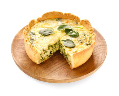 Plate with tasty spinach tart on white background clipart