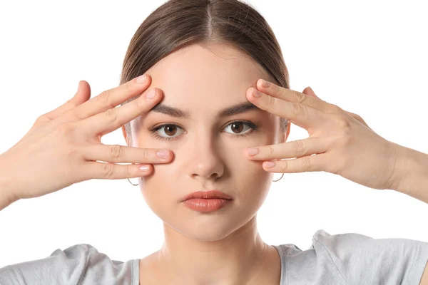 Hermosa Joven Haciendo Yoga Facial Sobre Fondo Blanco —  Fotos de Stock