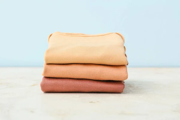 Stack Baby Clothes Color Background — Stock Photo, Image