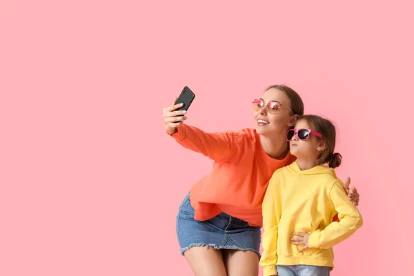 Young Woman Her Little Daughter Taking Selfie Color Background — Stock Photo, Image