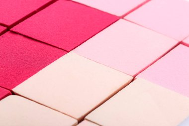 Makeup sponges as background, closeup