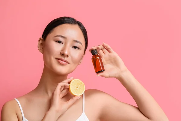 Beautiful Young Woman Lemon Bottle Essential Oil Color Background — Stock Photo, Image