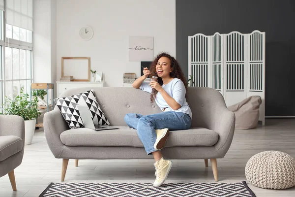 Young African American Woman Eating Chocolate Paste Home — Stock Photo, Image