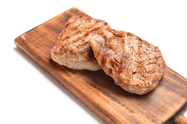 Wooden Board Tasty Beef Steaks White Background Closeup — Stockfoto