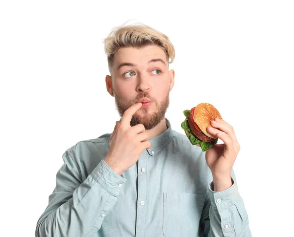 Junger Mann Mit Leckerem Veganen Burger Auf Weißem Hintergrund — Stockfoto