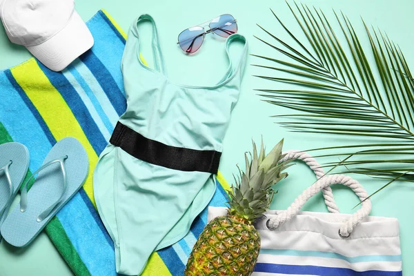Composition Stylish Swimsuit Beach Accessories Pineapple Color Background — Stock Photo, Image