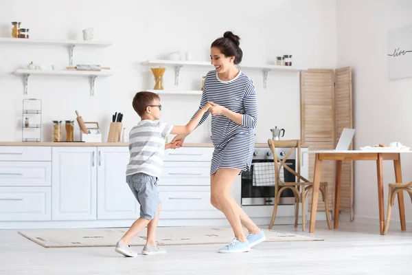 Young Woman Her Little Son Dancing Kitchen — Stock Photo, Image