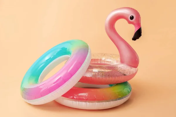 Inflatable rings on color background