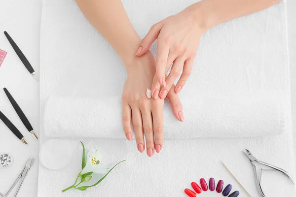 Woman Beautiful Manicure Applying Cream Hands Salon — Stock Photo, Image
