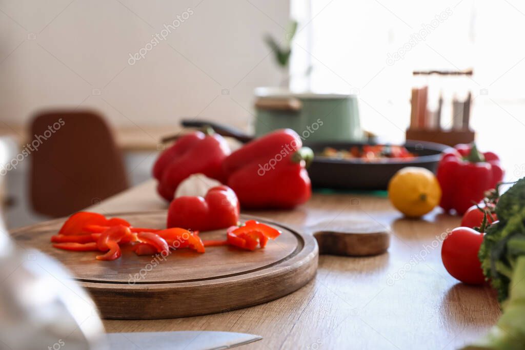 Fresh vegetables on table in kitchen, closeup