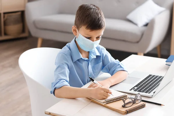Little Schoolboy Medical Mask Studying Home — Stock Photo, Image