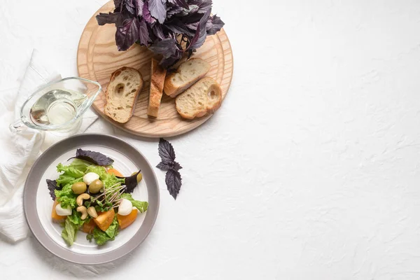 Composition Tasty Fresh Salad Bread Jug Oil Light Background — Stock Photo, Image