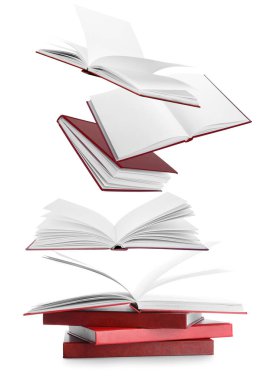 Beyaz arkaplan üzerine uçan kitaplar