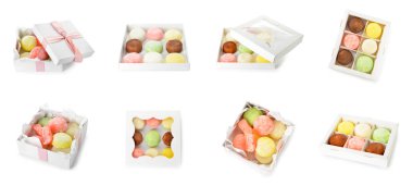 Beyaz arka plandaki kutularda lezzetli Japon mochi 'si.