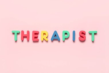 Renk arkaplanı üzerinde sözcük THERAPIST