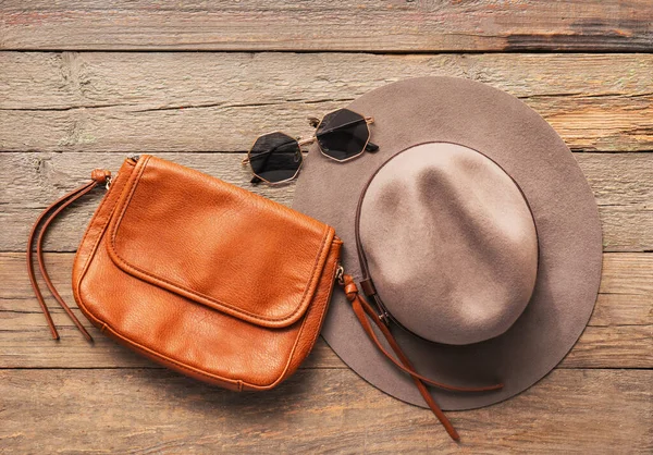 Stylish Hat Bag Sunglasses Wooden Background — Stock Photo, Image