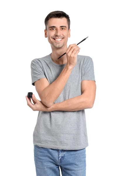 Junge Männliche Kalligraphin Mit Pinsel Und Tusche Auf Weißem Hintergrund — Stockfoto