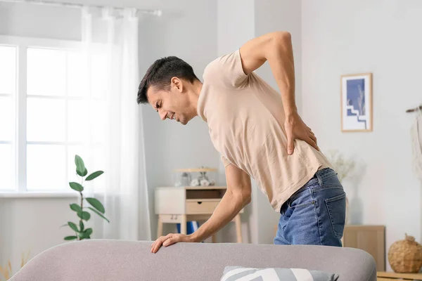 Young Man Suffering Back Pain Home — Stock Photo, Image