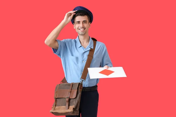 Handsome Young Postman Letter Color Background — Stock Photo, Image