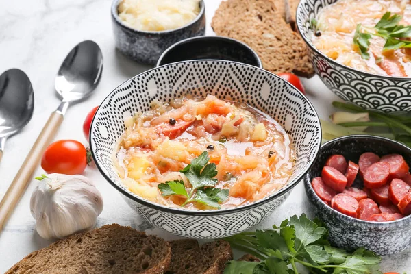 Bowl Tasty Sauerkraut Soup Ingredients Light Background — Stock Photo, Image