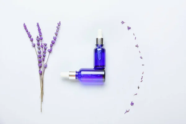 Creative Composition Bottles Lavender Essential Oil Flowers Light Background — Stock Photo, Image