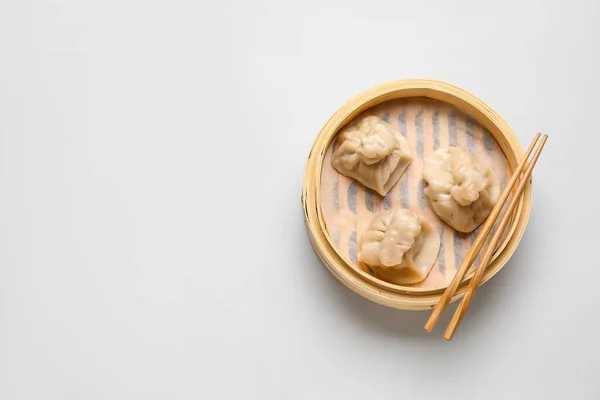 Bamboo Steamer Tasty Dumplings Chopsticks Light Background — Stock Photo, Image