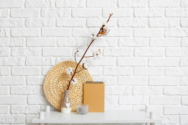 Vase Cotton Flowers Notebook Shelf Brick Wall — Stock Photo, Image