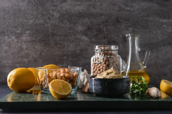 Bowl Tasty Hummus Ingredients Dark Background — Stock Photo, Image