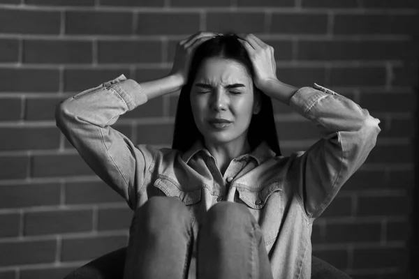 Black White Portrait Depressed Young Woman Sitting Brick Wall — Stock Photo, Image